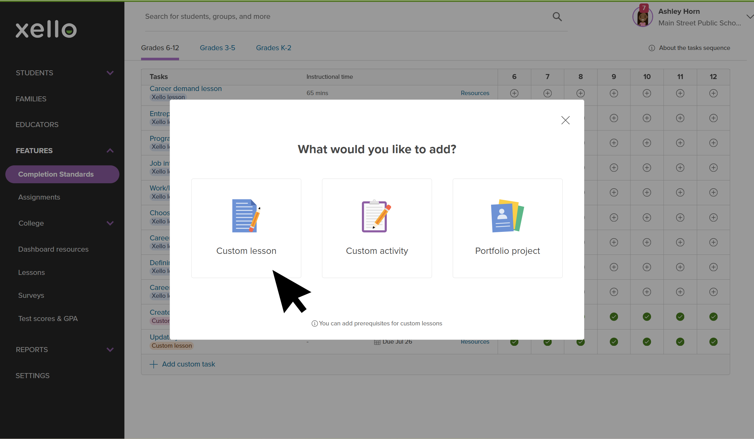 Click to enlarge Educator account in Xello. The modal to add custom tasks is open and the cursor is selecting Custom lesson.